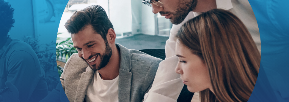 Three people looking at a document on a table.