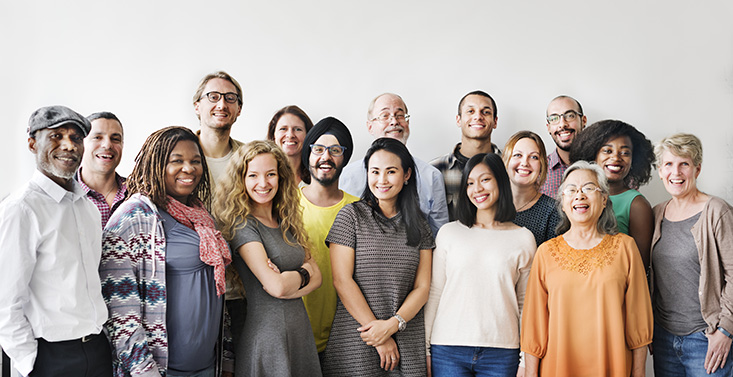 A group of adults from different backgrounds