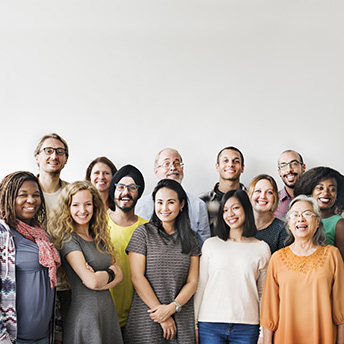 A group of young adults from diverse backgrounds.