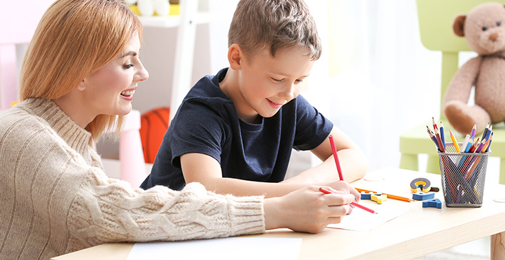 Communication health Assistant helping a child